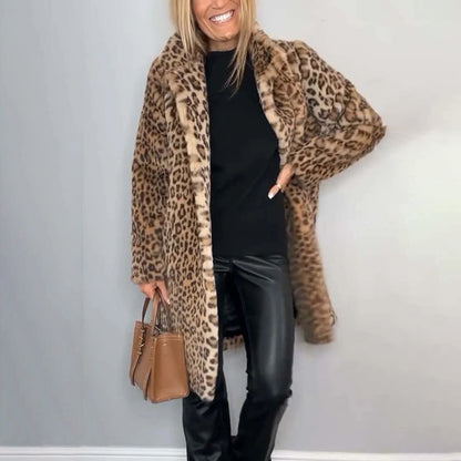 Person wearing a leopard print coat with a plain background