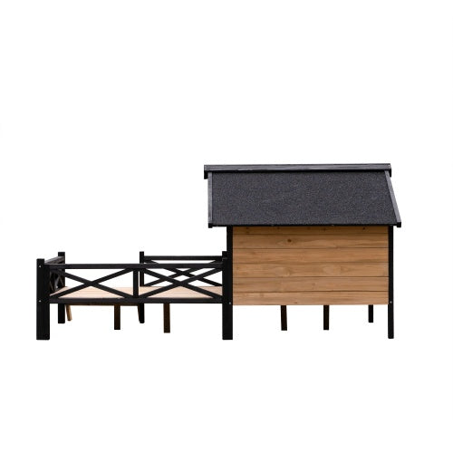 Wooden dog house with black roof and fence on a white background