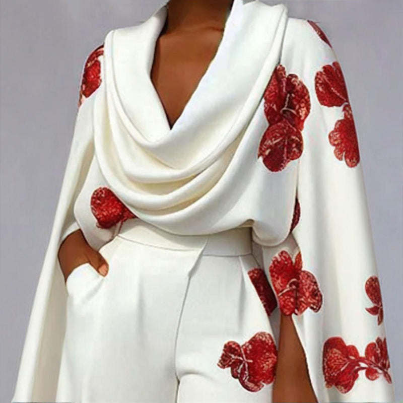 White garment with red floral patterns on a plain background
