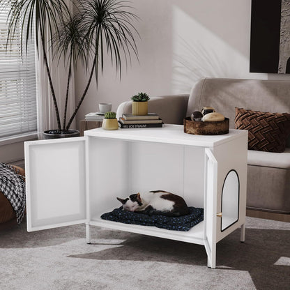 White pet enclosure with a cat inside in a living room setting.