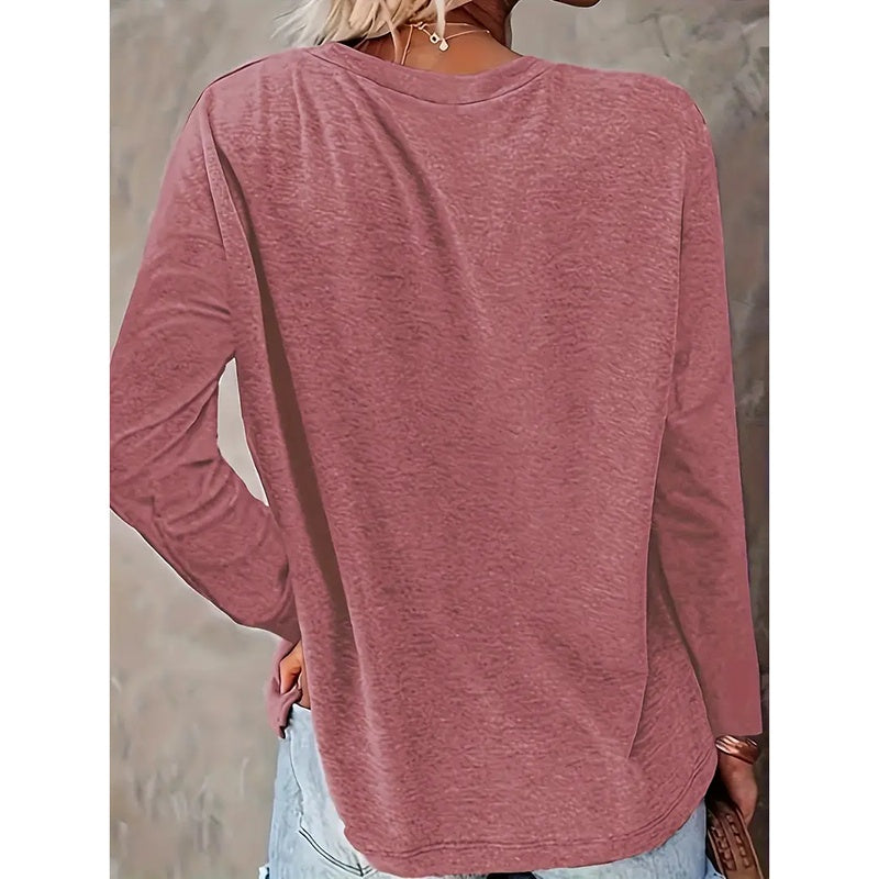 Mauve long-sleeve top worn by a person with a neutral background