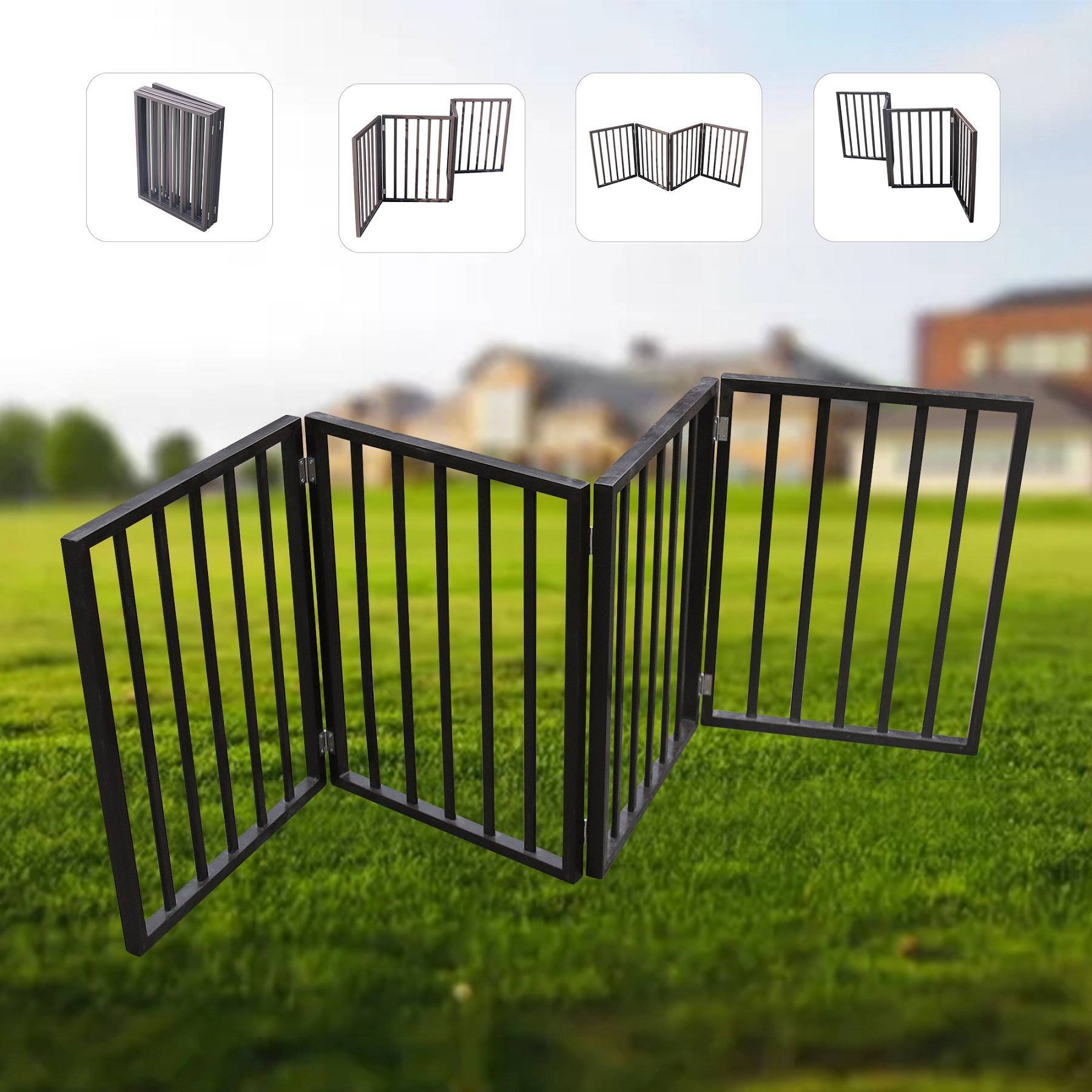 Black metal pet gate on grass with a blurred background
