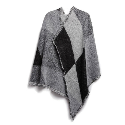 Gray and black patterned poncho on a white background