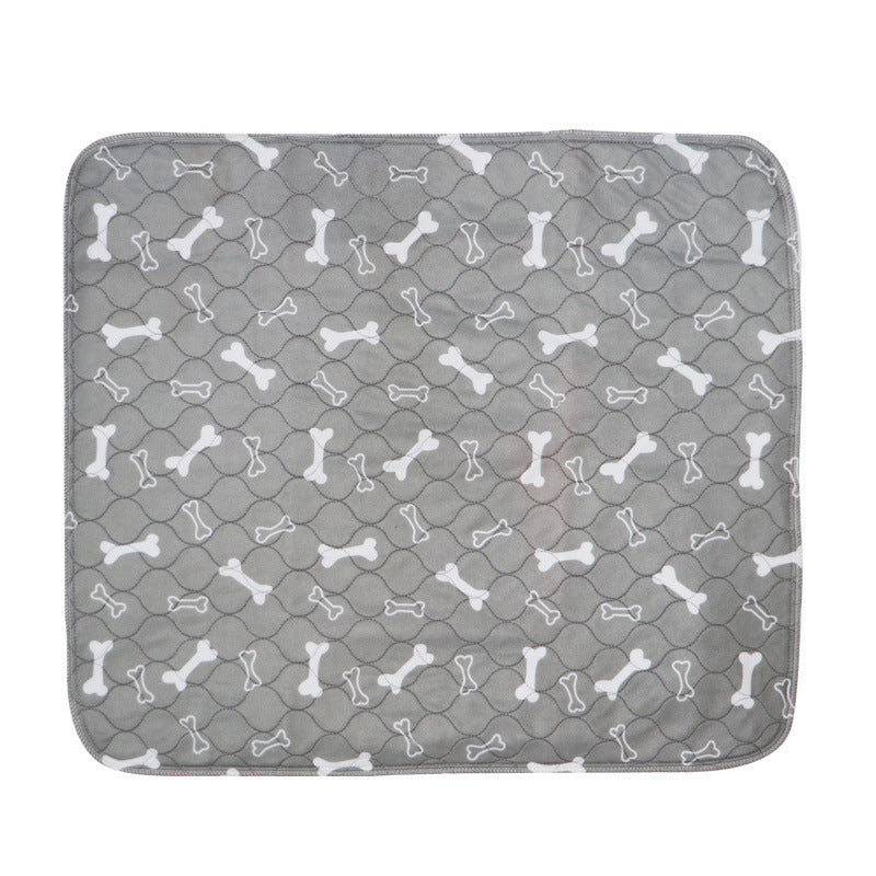 Gray pet mat with white bone pattern on a white background