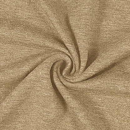 Close-up of beige fabric with a swirl pattern