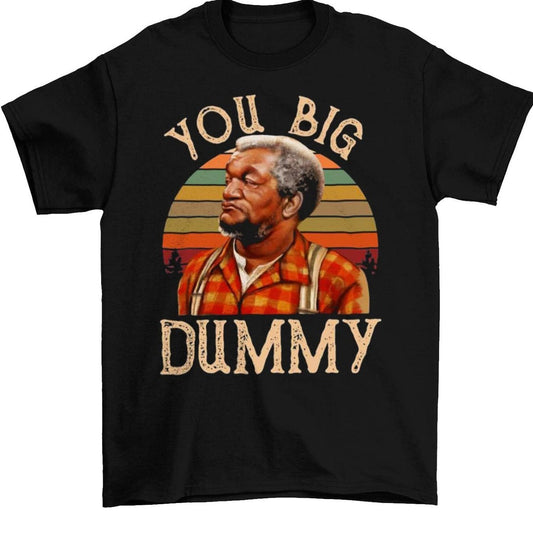 Black t-shirt with a graphic of a man in a plaid shirt and 'You Big Dummy' text on a white background