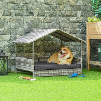 Dog lying on a wicker pet house with a stone wall background