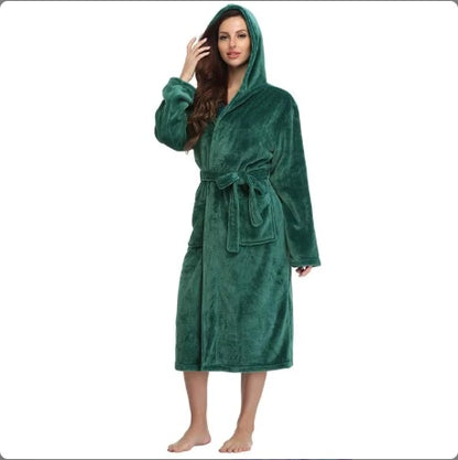 Woman wearing a green robe on a white background