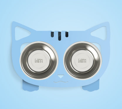 Blue cat-shaped pet feeder with two stainless steel bowls on a light blue background
