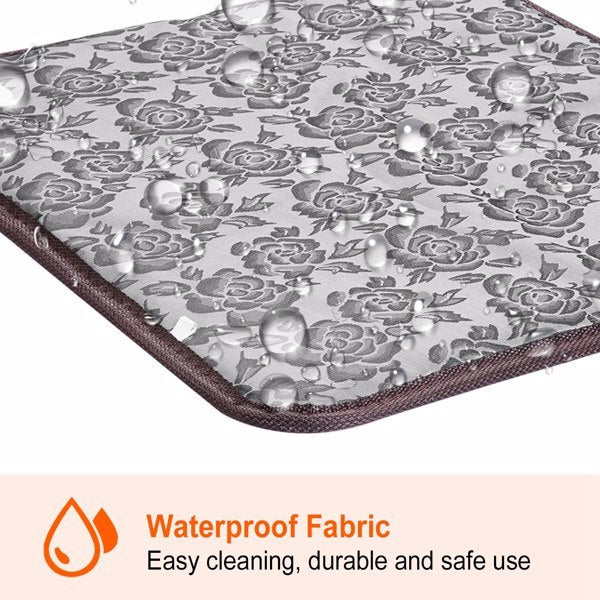 Floral-patterned waterproof fabric with water droplets on a white background