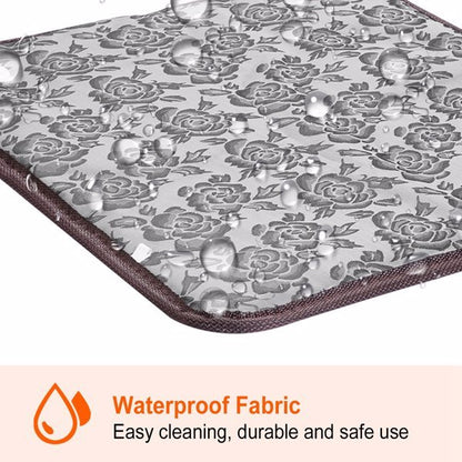 Floral-patterned waterproof fabric with water droplets on a white background