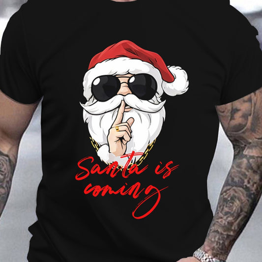 Black t-shirt with a graphic of Santa Claus wearing sunglasses and the text 'Santa is coming' on a plain background.