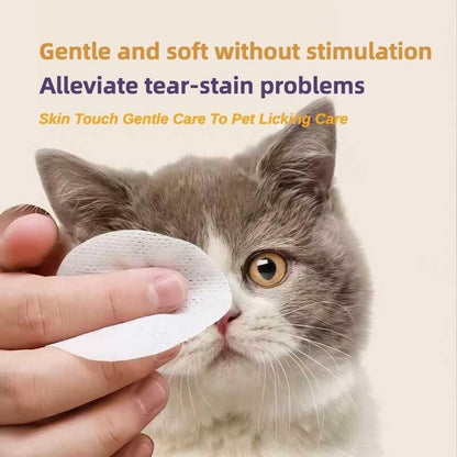 Cat being cleaned with a white pad by a hand, with text about alleviating tear-stain problems.