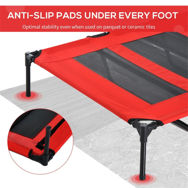 Red and black trampoline with anti-slip pads on a gray surface