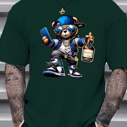 Green t-shirt with a cartoon bear holding a phone and bottle, worn by a person with tattoos.