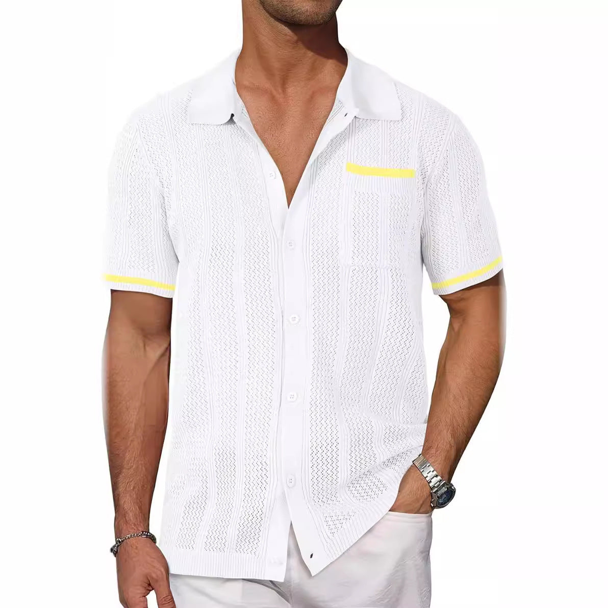 Man wearing a white textured shirt with yellow accents on a white background