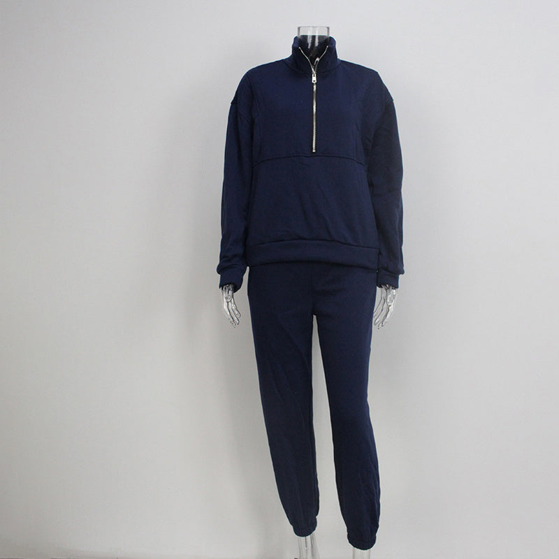 Navy tracksuit on a mannequin against a white background