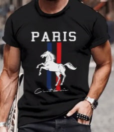Person wearing a black t-shirt with a graphic design of a horse and text on a blurred background