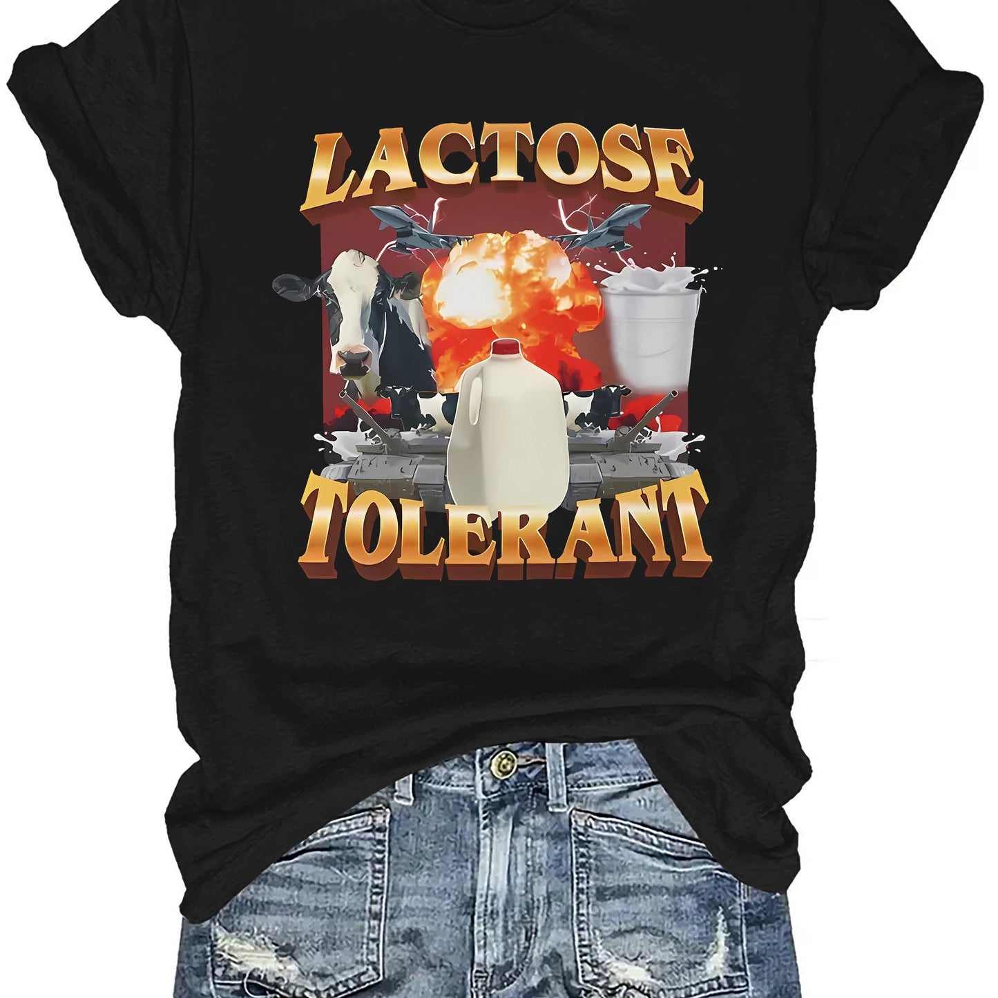 Black t-shirt with a graphic design featuring a cow, milk carton, and explosion text 'LACTOSE TOLERANT'.