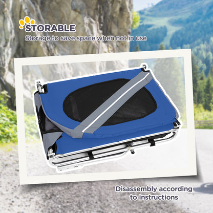 Blue and silver storage bag with mountain landscape in the background