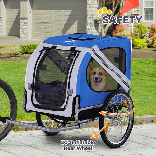 Blue and white bicycle trailer with a dog inside, parked on a sidewalk.