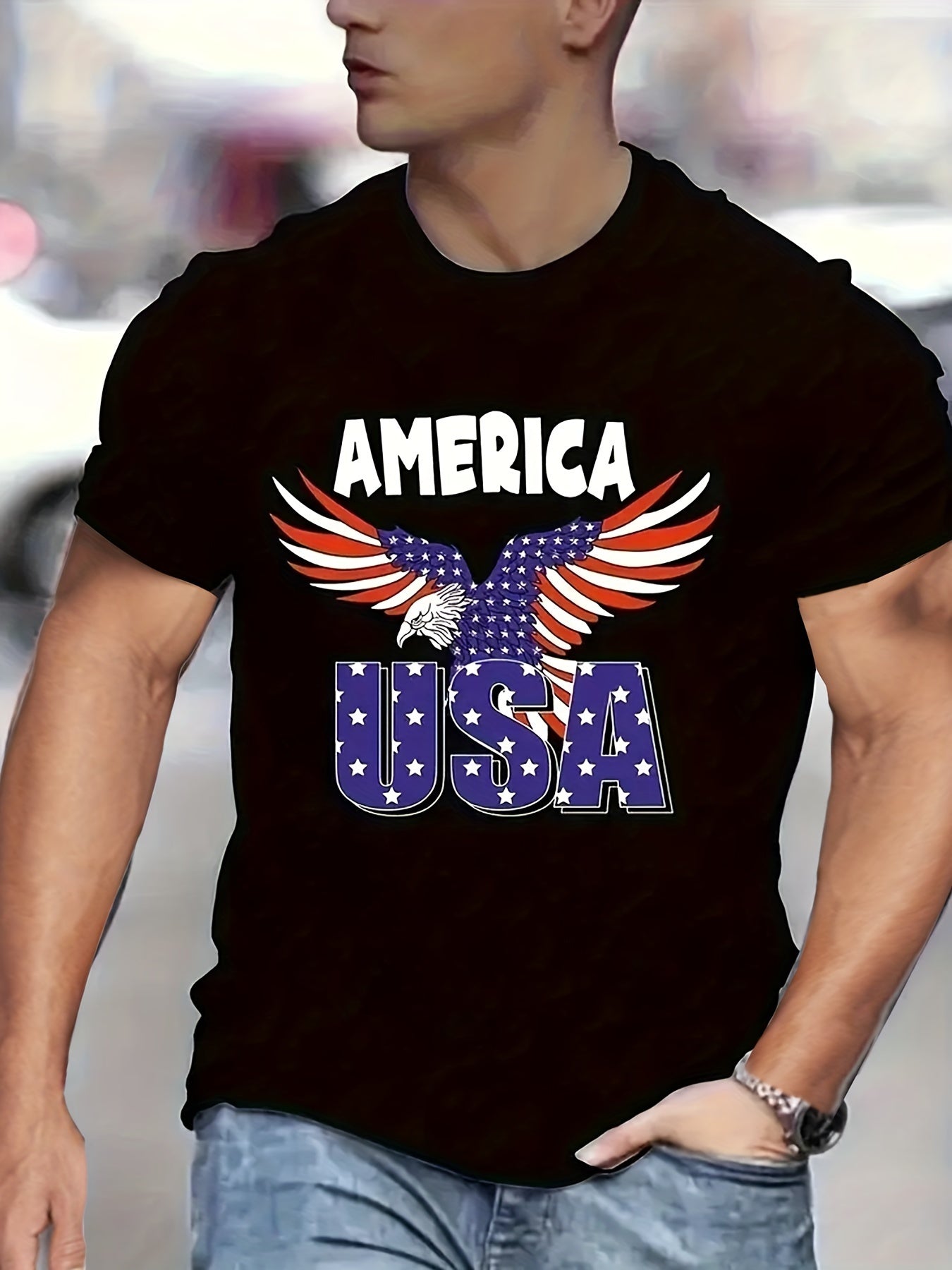 Person wearing a black t-shirt with 'America USA' design featuring an eagle and American flag.