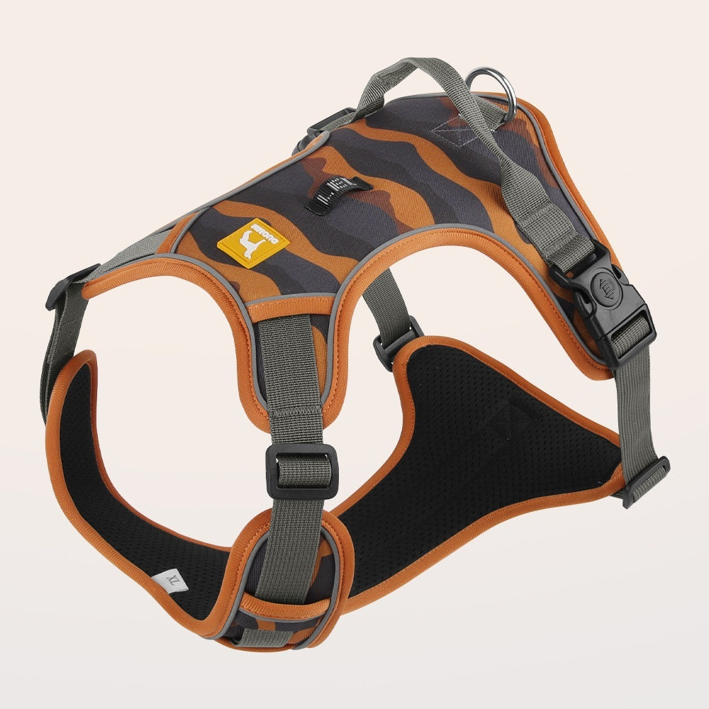 Dog harness with orange and black design on a beige background