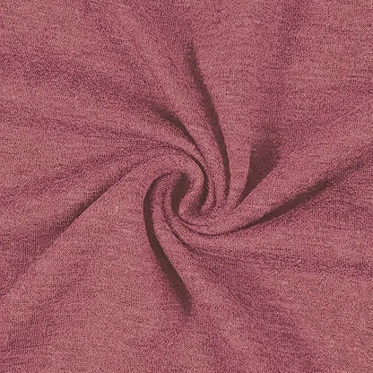 Close-up of pink fabric with a swirl pattern
